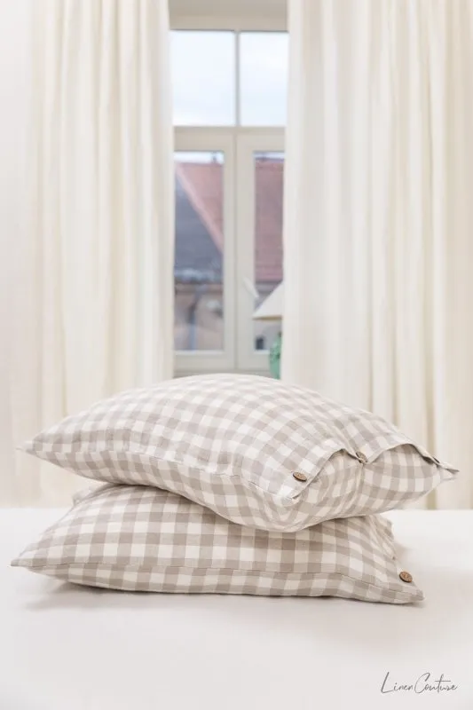 White linen pillowcase with coconut buttons